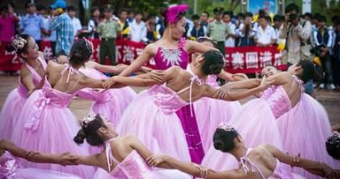Performers go thorugh a routine in Chengmai prior to the stage presentations.