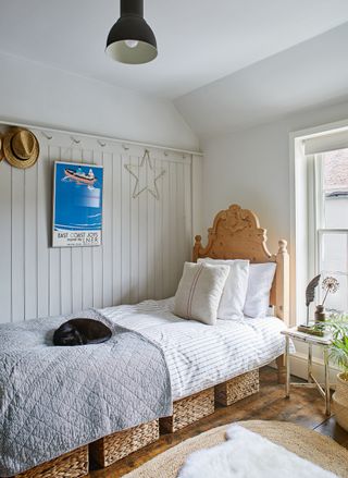 Weatherboarded white bedroom