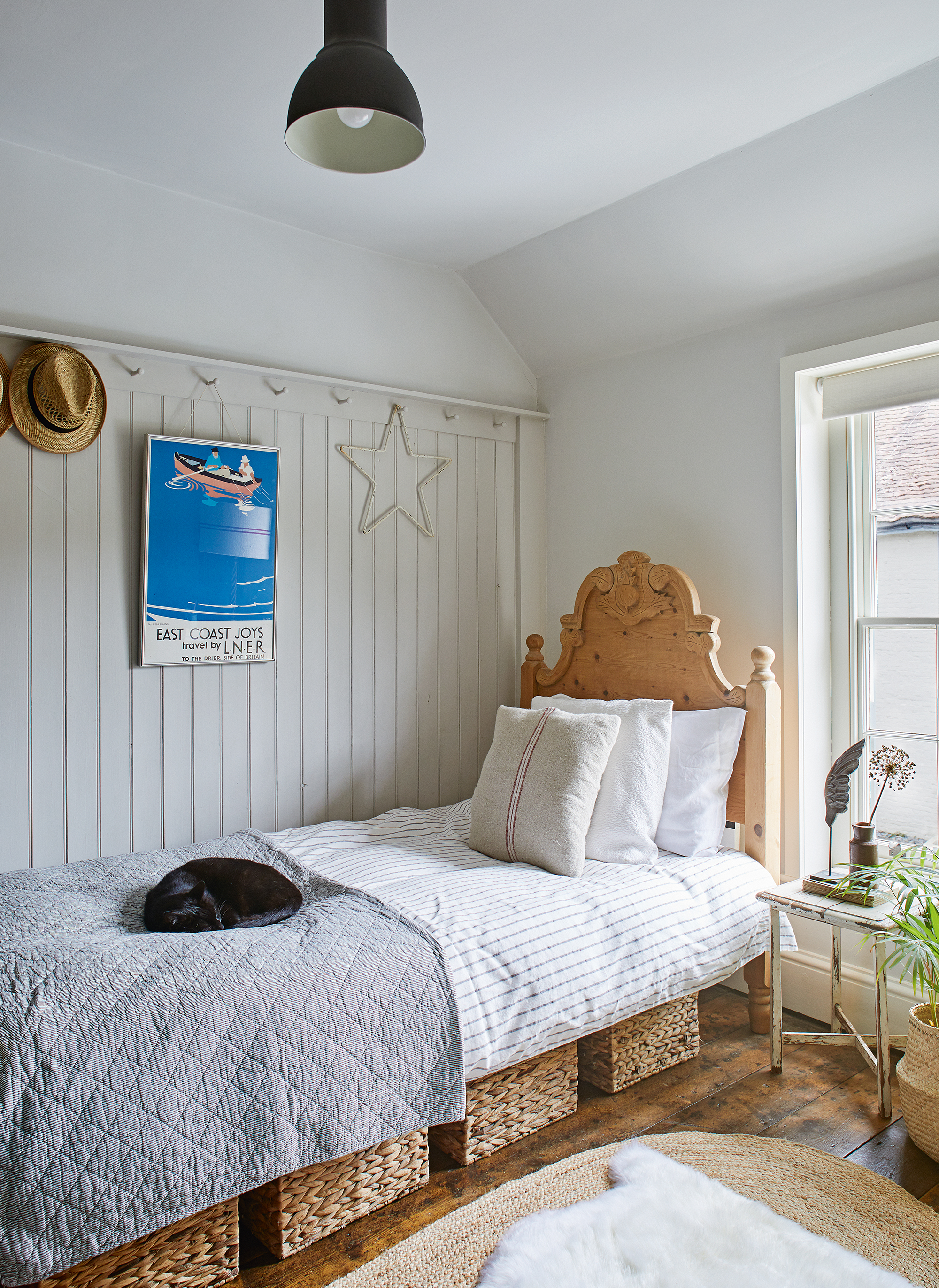 Weatherboarded white bedroom