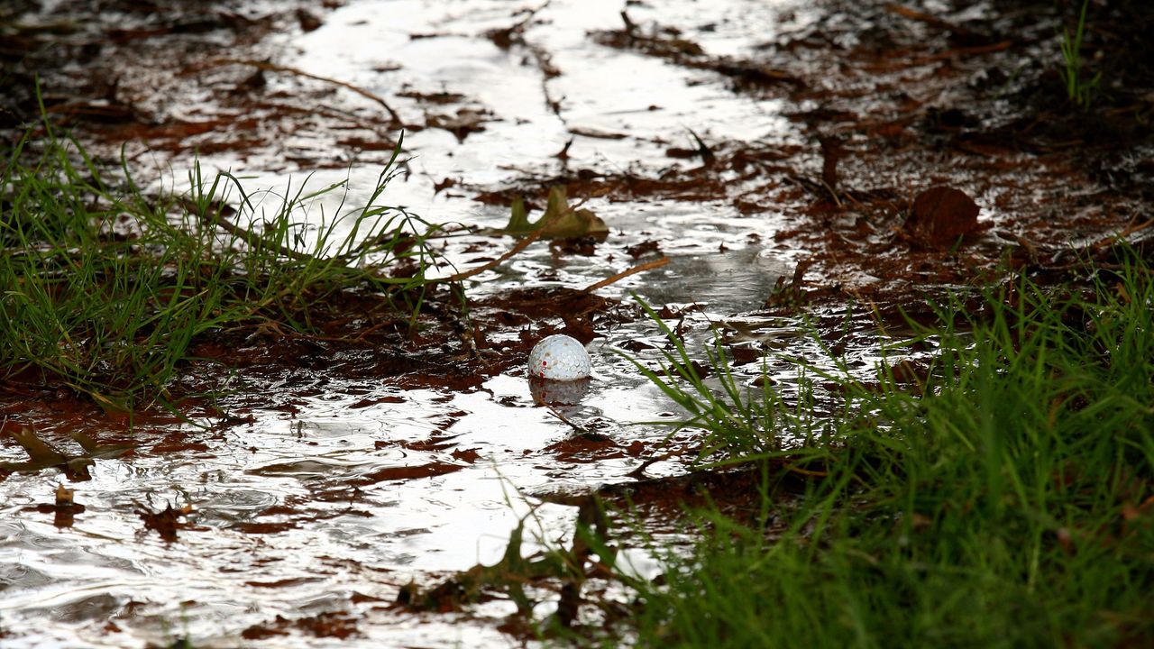 A golf ball in a stream