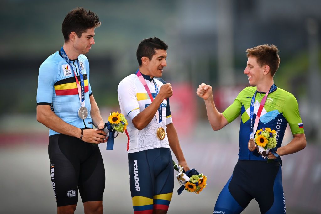 Belgian Wout Van Aert of Team JumboVisma winner of the silver medal Ecuadorian Richard Carapaz of Ineos Grenadiers winner of the gold medal and Slovenian Tadej Pogacar of UAE Team Emirates winner of the bronze medal pictured on the podium of the mens cycling road race on the second day of the Tokyo 2020 Olympic Games with finish at the Fuji Speedway in Gotenba Tokyo Japan on Saturday 24 July 2021 The postponed 2020 Summer Olympics are taking place from 23 July to 8 August 2021 BELGA PHOTO JASPER JACOBS Photo by JASPER JACOBSBELGA MAGAFP via Getty Images