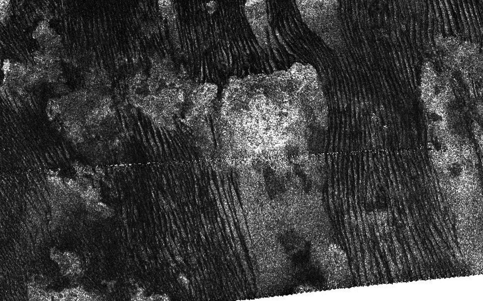 Cassini Captures Familiar Forms on Titan’s Dunes 1920