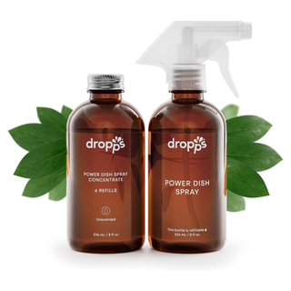 Two glass bottles of dropp dishwashing spray