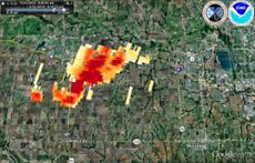 This experimental product shows the track of the preliminary EF3 tornado near El Reno, Okla. Red indicates higher rotational velocity. 