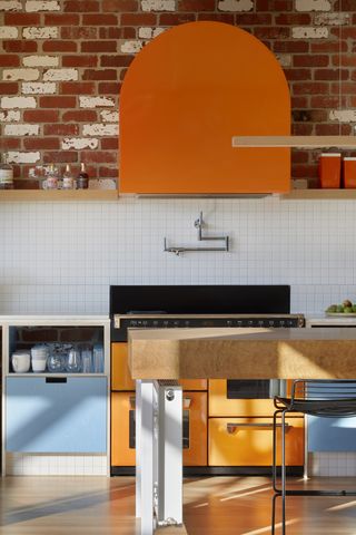 A supersize butcher block countertop in a kitchen