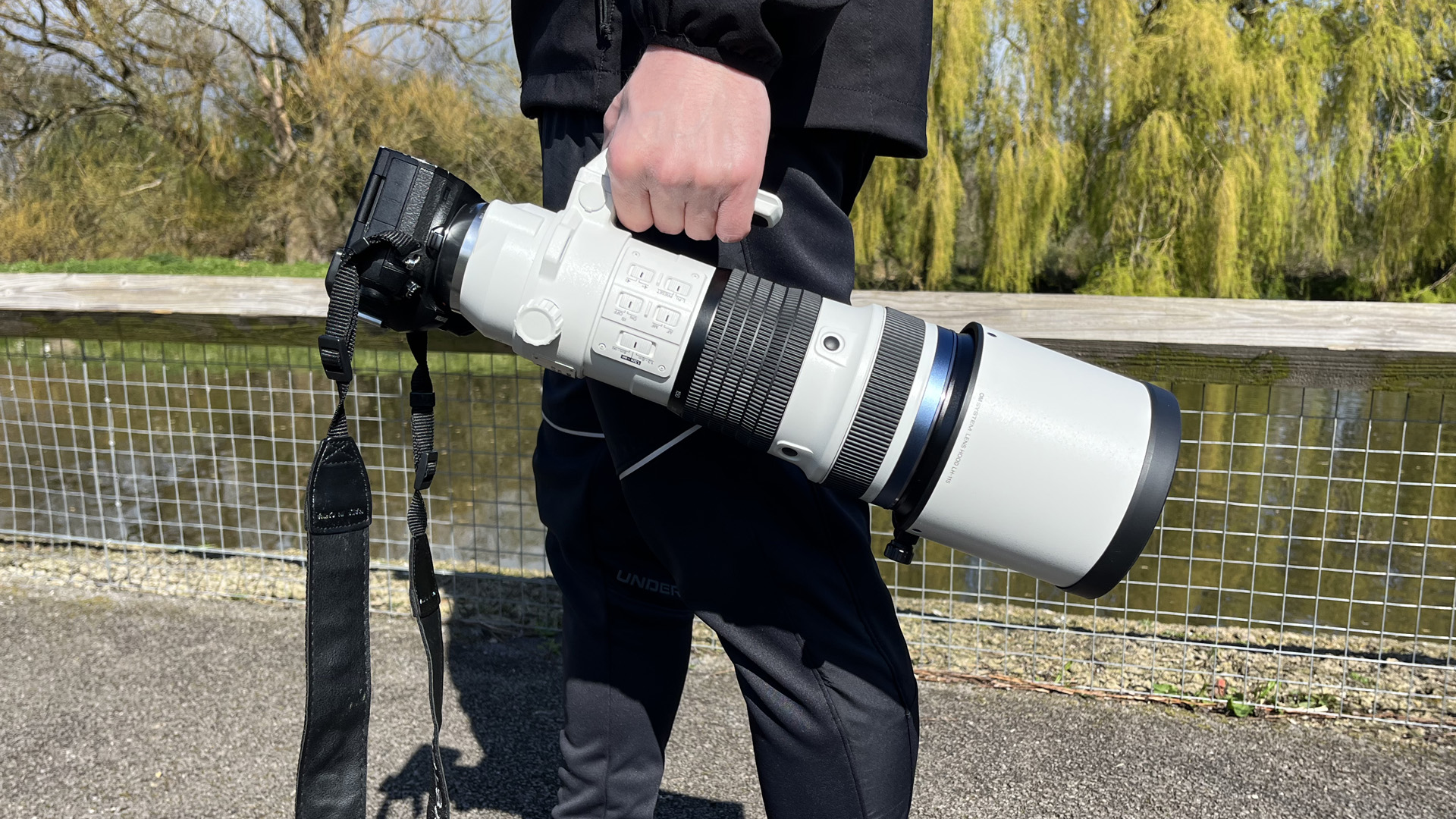 Mike Harris holding OM System M.Zuiko 150-400mm f/4.5 TC1.25x IS PRO at Slimbridge Wetland Centre 