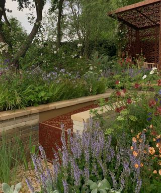 water feature at morris & co garden at chelsea flower show 2022