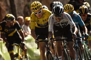 Great Britains Geraint Thomas CL wearing the overall leaders yellow jersey and Colombias Egan Bernal Front R ride ahead of the pack during the 14th stage of the 105th edition of the Tour de France cycling race between SaintPaulTroisChateaux and Mende on July 21 2018 Photo by Marco BERTORELLO AFP Photo credit should read MARCO BERTORELLOAFP via Getty Images