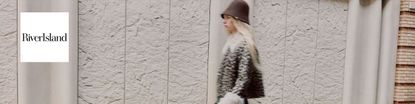 river island logo top left with a wide image of a model walking