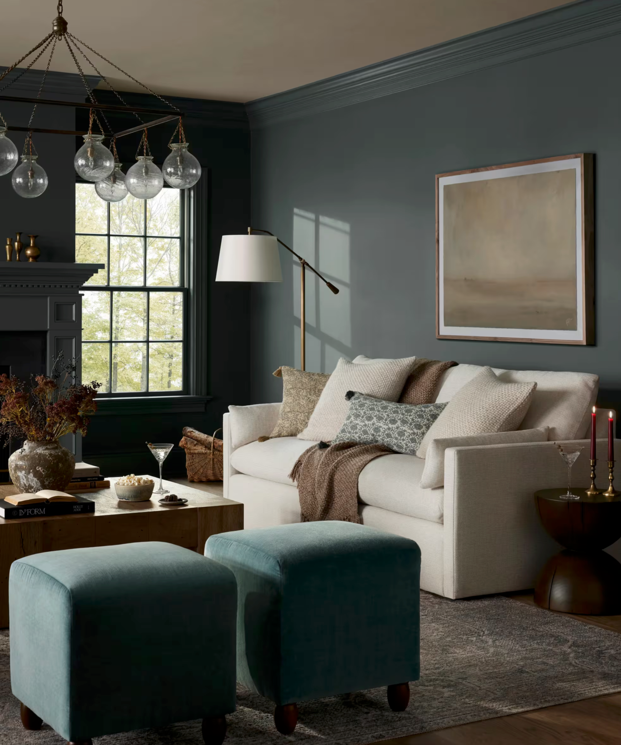 Dark blue living room with small white sofa