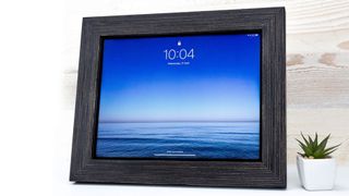 An Eventframe frame on an iPad showing a photo of the sea