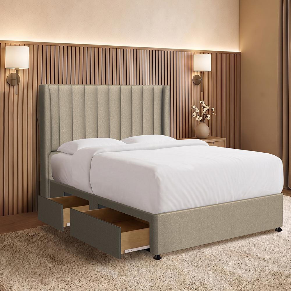 Grey high-back upholstered bed with drawers in the divan