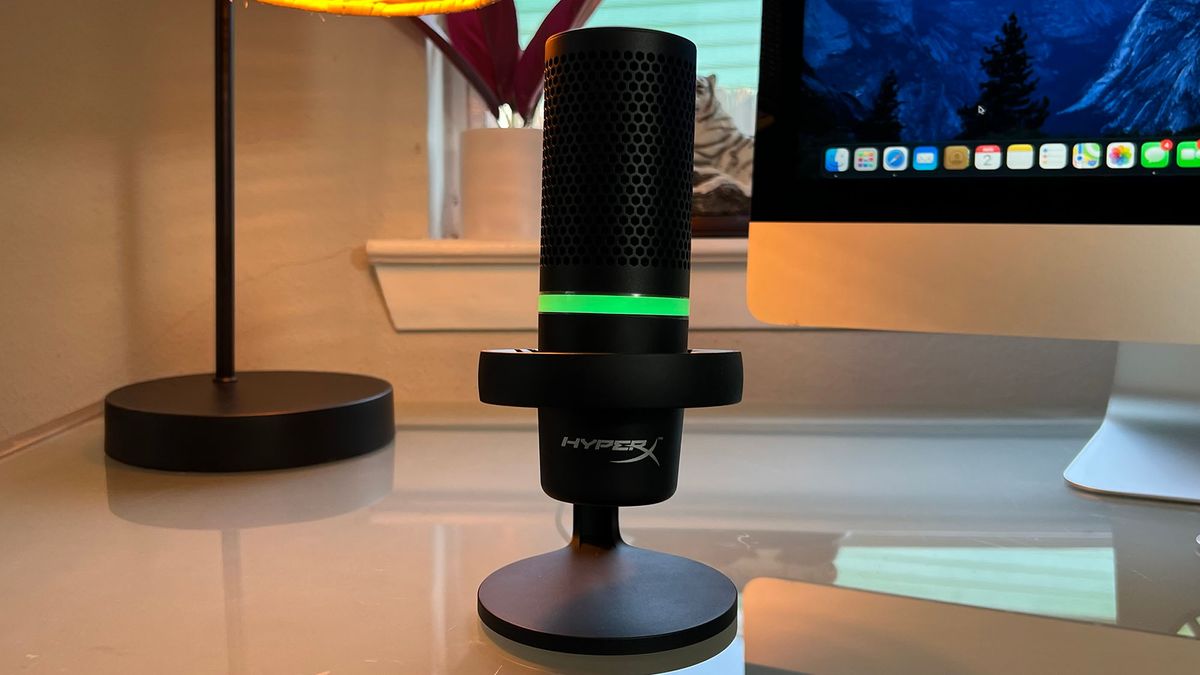 A hyperX duocast on a glass desk