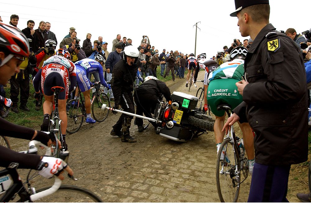 Even the TV Motos can come into difficulty on the cobbles