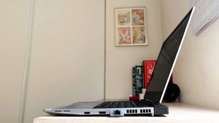 Framework Laptop 16 review unit on desk, right side facing camera