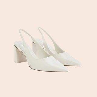 flat lay image of white heels 