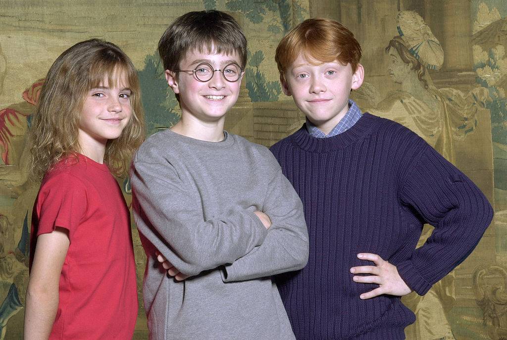 Daniel Radcliffe, Emma Watson and Rupert Grint being revealed as Harry Potter, Hermione and Ron back in 2000 for the original movies