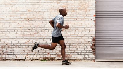 Man running in a city