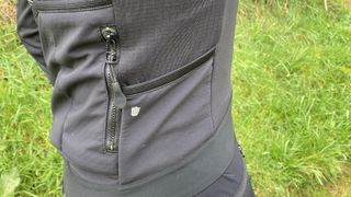 Detail of pocket on Rockrider Slim-Fit Softshell Mountain Biking Jacket
