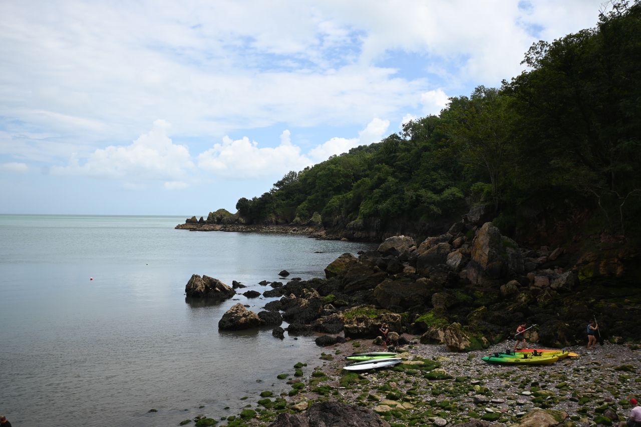 A bay under a cloudy blue sky