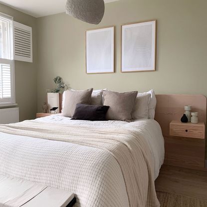 bedroom with sage green painted wall