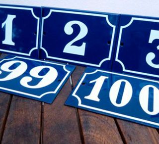 french enamel door numbers with white numbers on blue plates