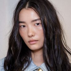 A model with hydrated under-eyes thanks to a hydrating eye cream.