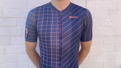 Male cyclist wearing the Santini Eco Sleek Dinamo Short Sleeve Jersey