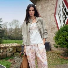 A woman wearing NEXT x National Trust's Spring Collection