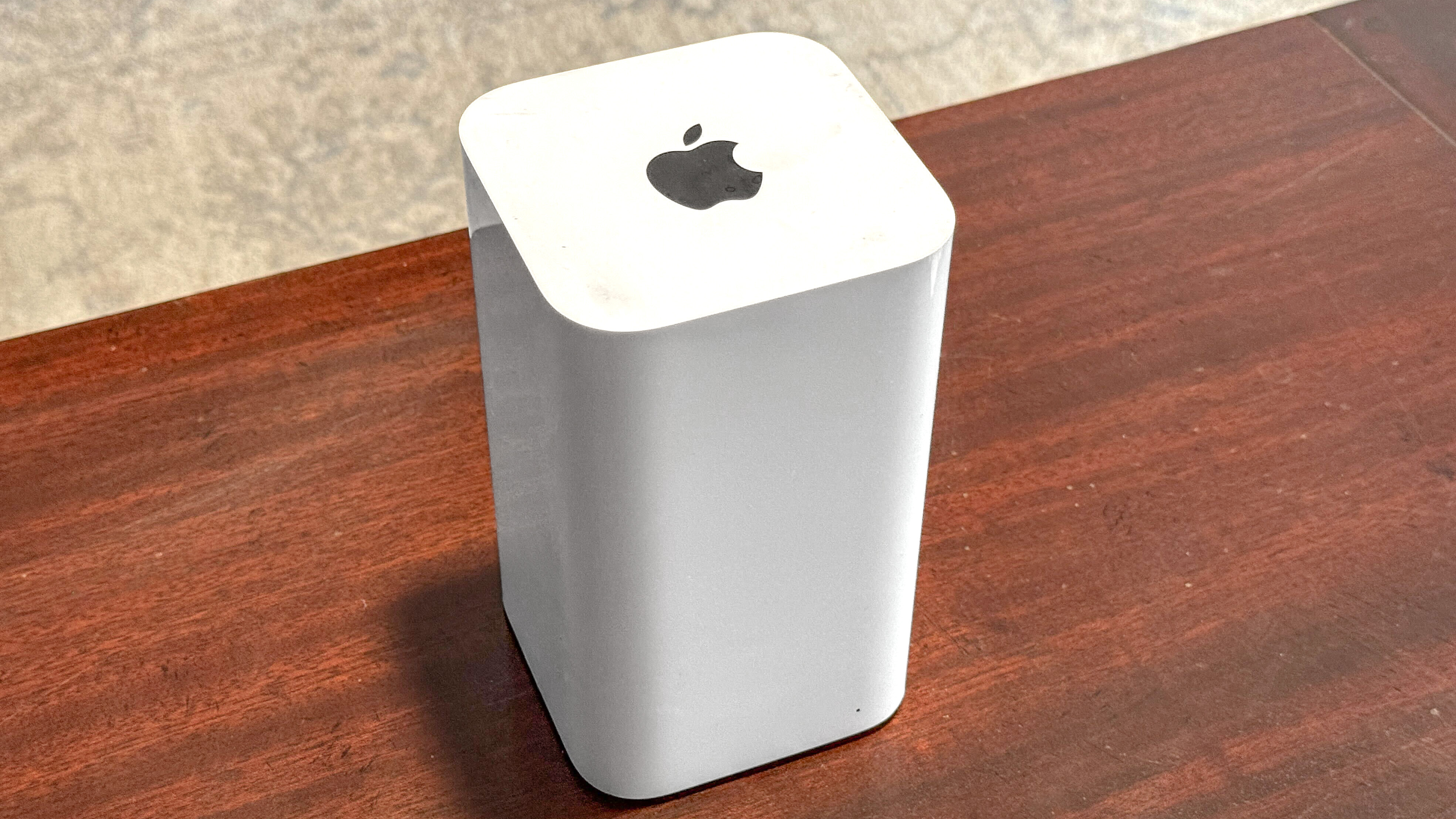 An Apple AirPort Extreme base station on a table