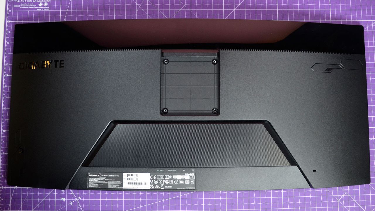 A Gigabyte GS34WQC gaming monitor on a desk