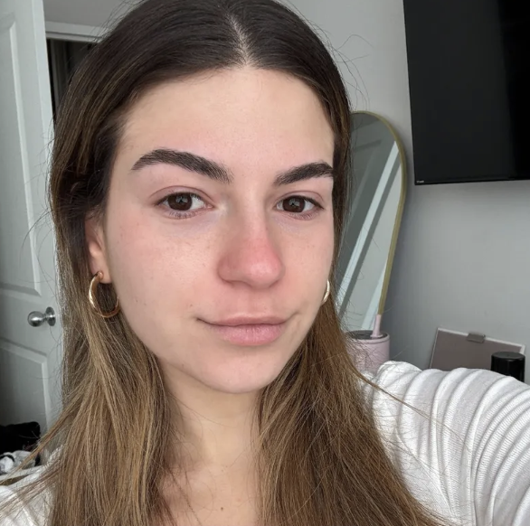 Girl with glowing skin post sheet mask
