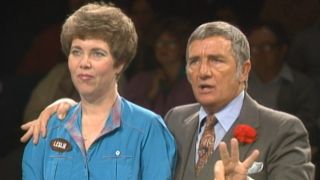 Richard Dawson and female contestant during Family Feud Fast Money Round