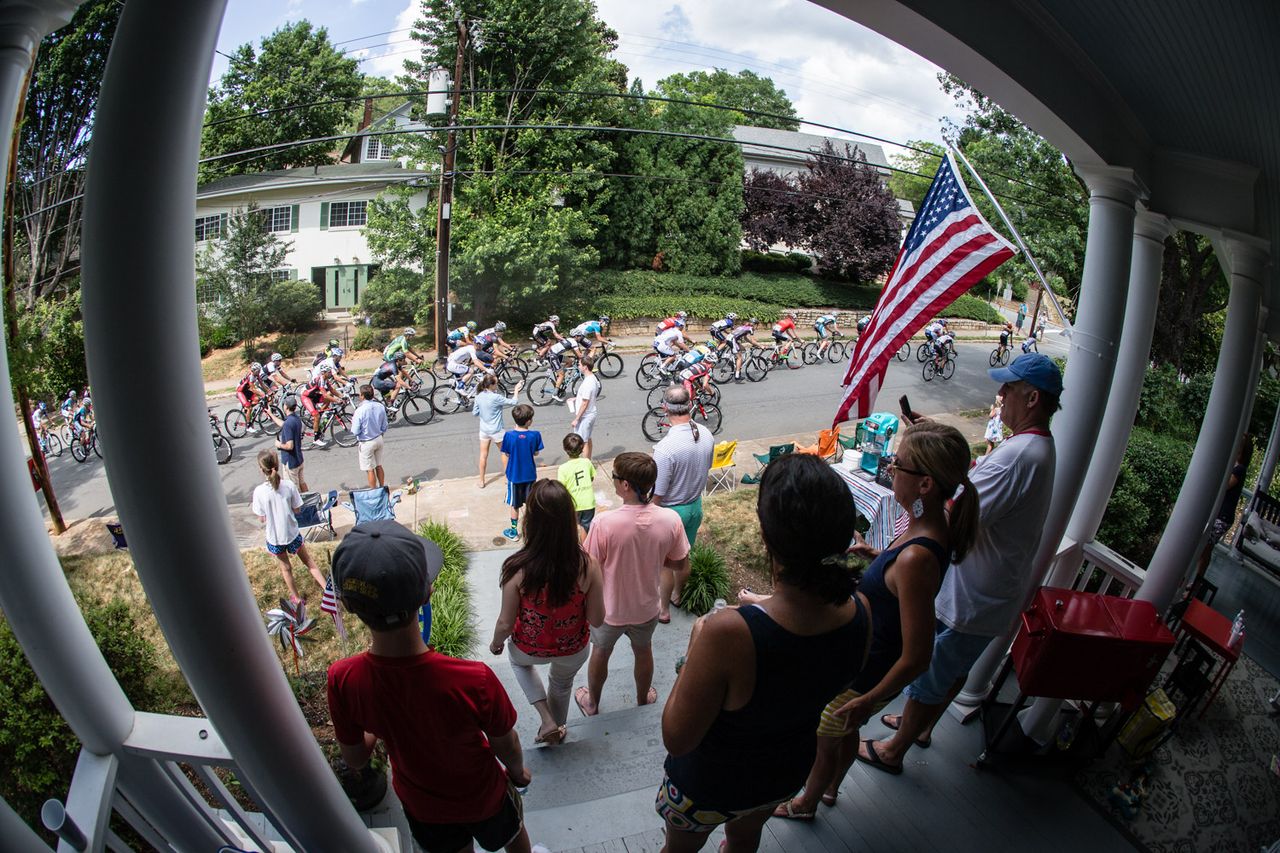 Fans watch as the race passes by.
