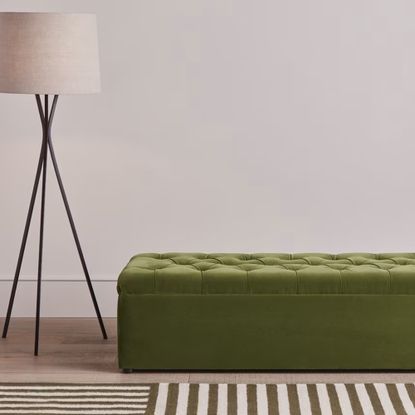 Loaf 'Bed-in-button' upholstered in green velvet fabric