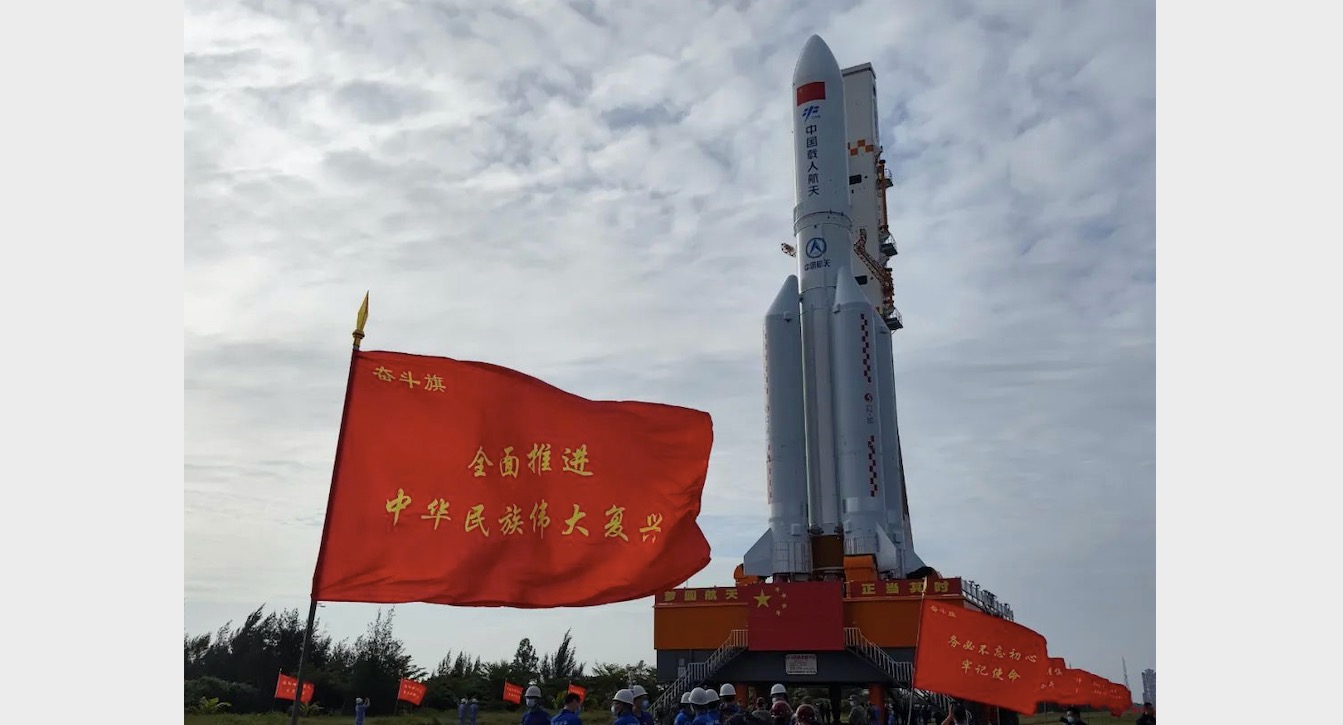 A Long March 5B rocket carrying the Mengtian module for China's Tiangong space station rolls out to the launch pad on Oct. 25, 2022.