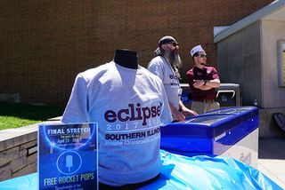 A custom T-shirt announces the multi-day program in Carbondale, Illinois, that will surround the total solar eclipse on Aug. 21, 2017.