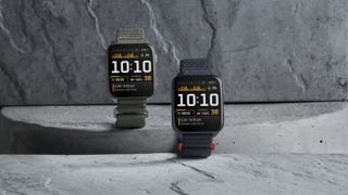Photo of two Garmin Venu X1 models, the Black with Slate Titanium Caseback and Black ComfortFit Nylon Band and Moss with Titanium Caseback and Moss ComfortFit Nylon Band.