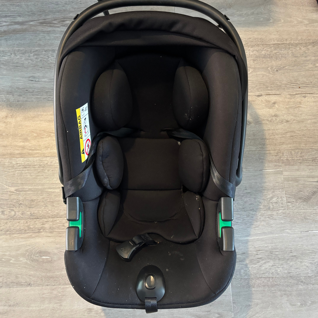 Using the Bissell SpotClean HydroSteam to clean a car seat- before image