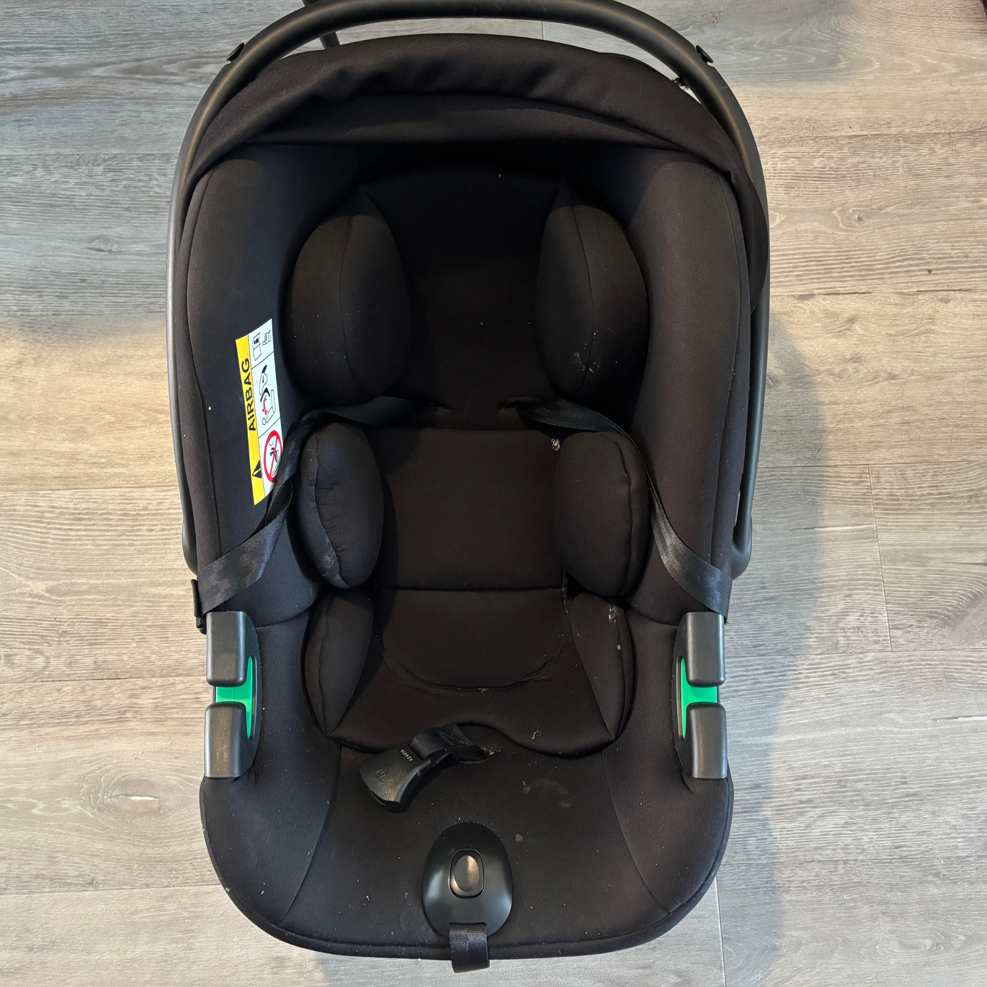 Using the Bissell SpotClean HydroSteam to clean a car seat- before image