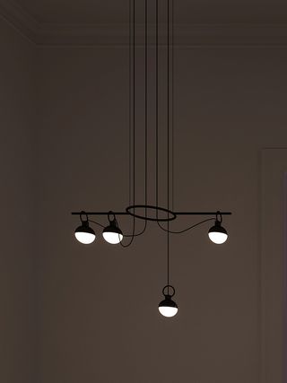 A 3D render of a light fixture. A black metal chandelier is hanging from the ceiling, with four lit-up light bulbs.