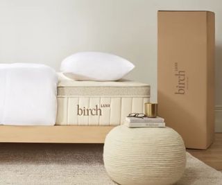 Birch Luxe Natural Mattress beside a Birch delivery box.