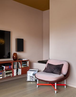pink living room with red accent colors