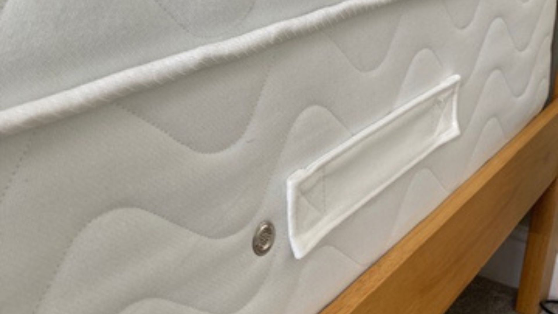 Evermore 1500 Pocket Spring Foam Hybrid Mattress in our tester, Linda's bedroom on a wooden bed frame