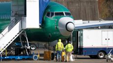 Workers inspect a fuselage at the Boeing plant in Renton, Washington.
