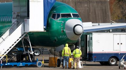 Workers inspect a fuselage at the Boeing plant in Renton, Washington.