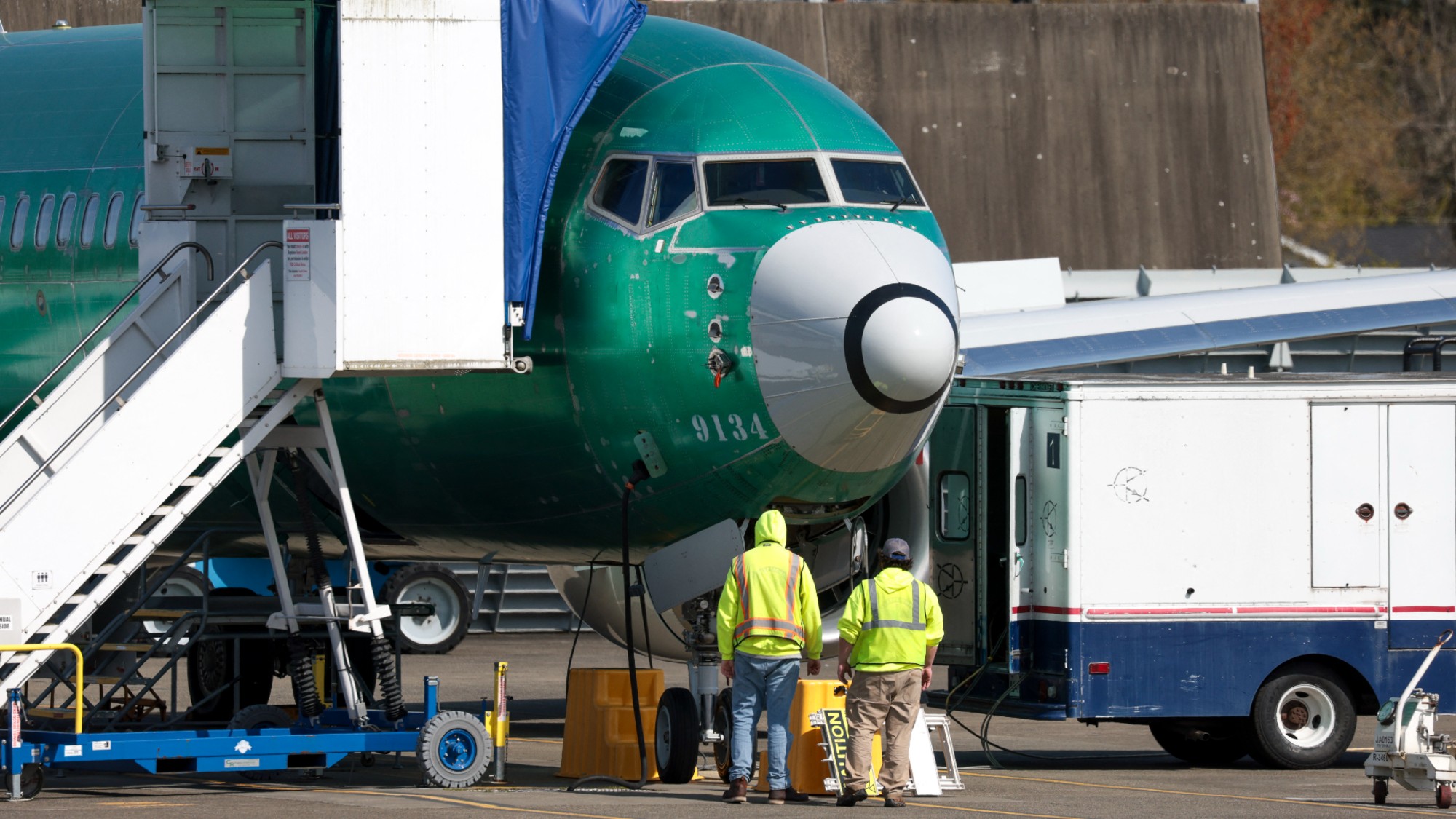 Workers inspect a fuselage at the Boeing plant in Renton, Washington. 