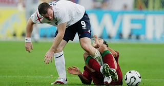 Wayne Rooney of England stamps on Ricardo Carvalho of Portugal during the FIFA World Cup Germany 2006 Quarter-final match between England and Portugal played at the Stadium Gelsenkirchen on July 1, 2006 in Gelsenkirchen, Germany