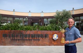 Donald holds the Ryder Cup outside the clubhouse