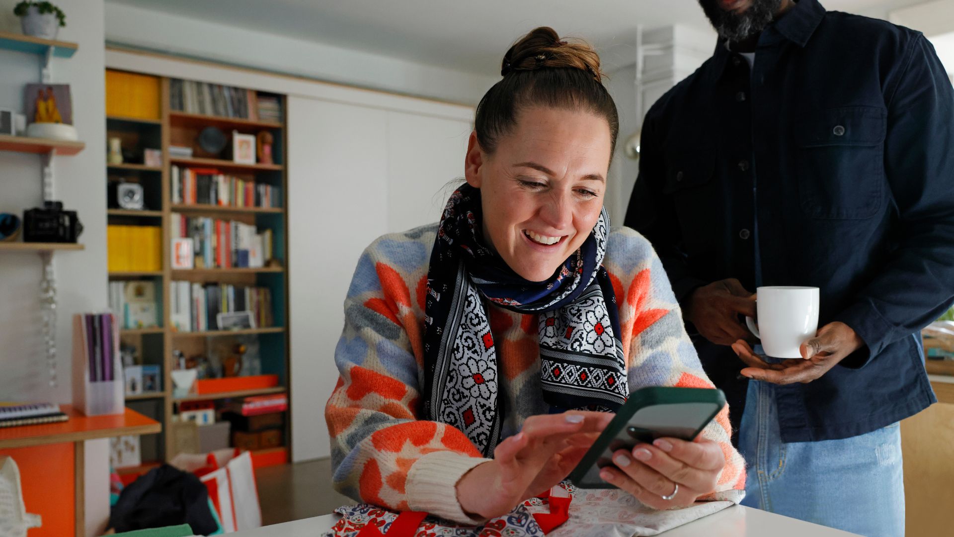 A woman online shopping on her smartphone